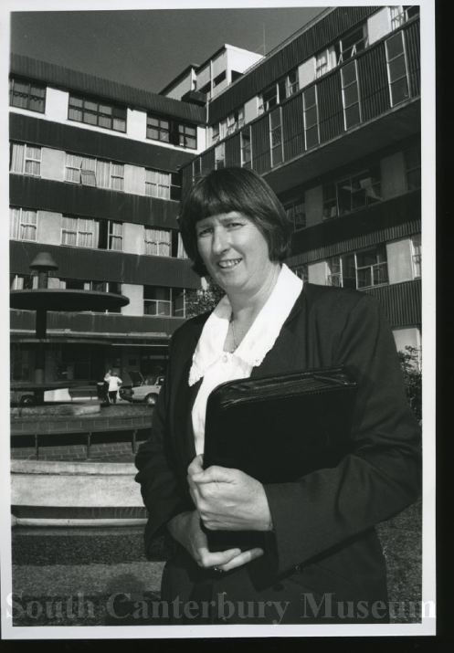 Patient advocate Anne Carnie posed outside the Timaru Public Hospital 16 April 1992 South Canterbury Museum
