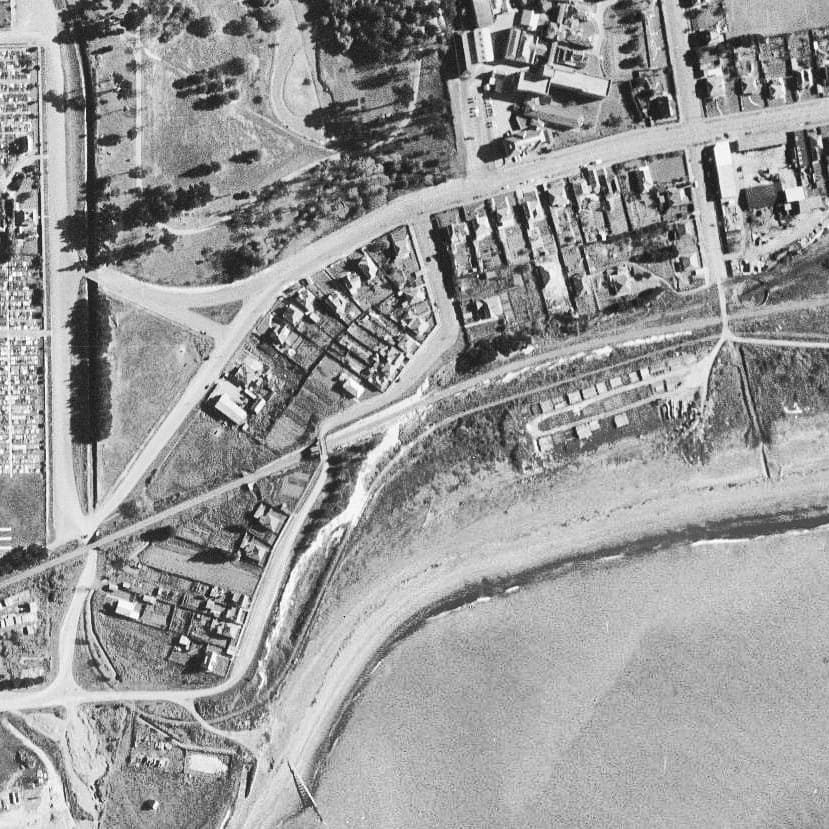 Retrolens photo showing the rail that went under the bridge at patiti point and up South Beach to the port to transport blue stone