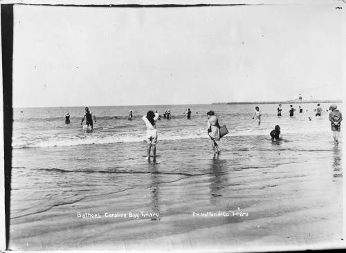 A group of bathers enjoying the water at Caroline Bay 1910 275288 Auckland Libraries